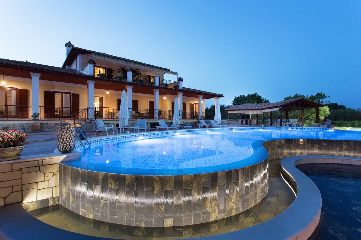 Aneli-Villa-Anastasia-Exterior-view-of-the-villa-and-the-pool-by-night